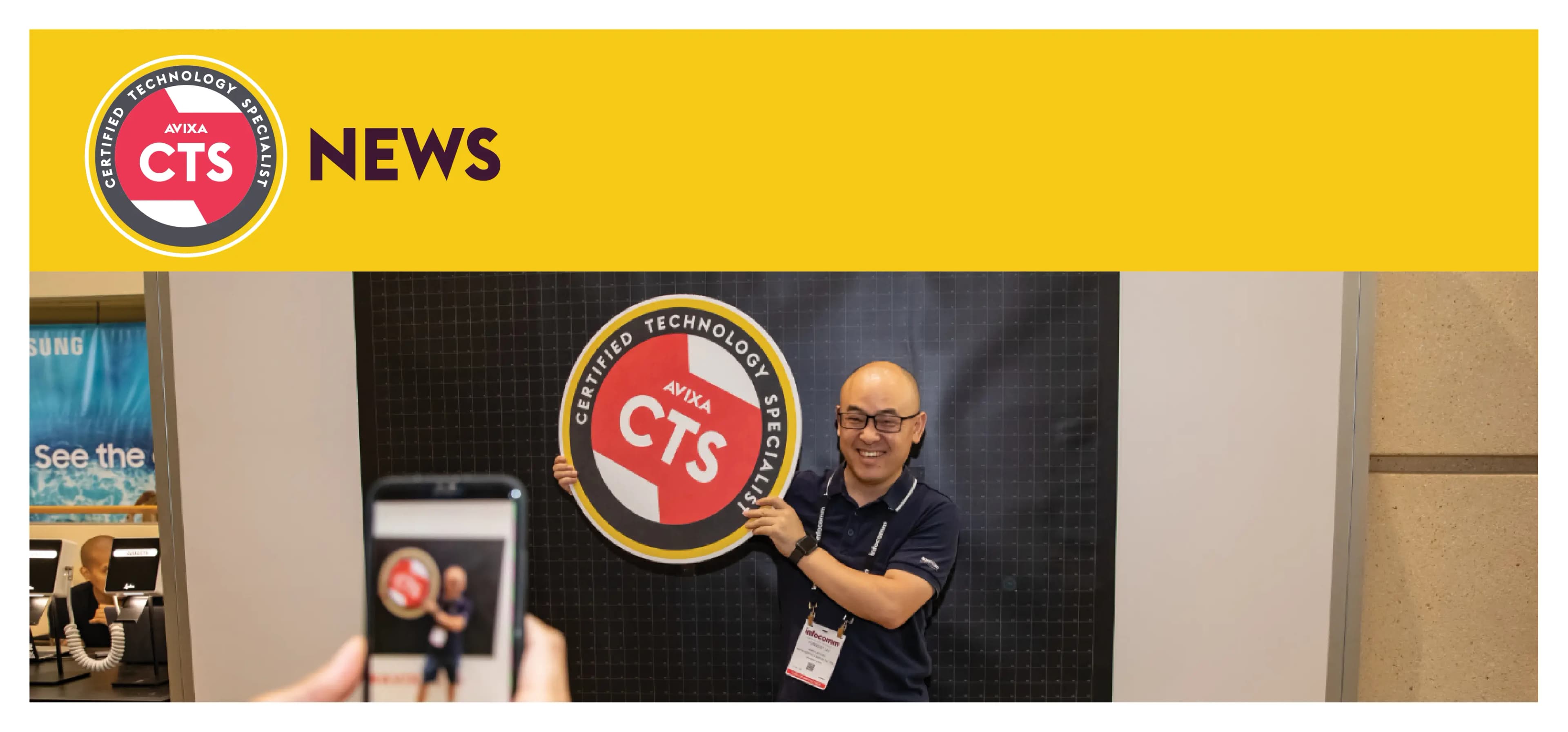 Man posing with a circular logo reading "CTS," someone takes a photo with a phone. Yellow header with "NEWS" text in the background.
