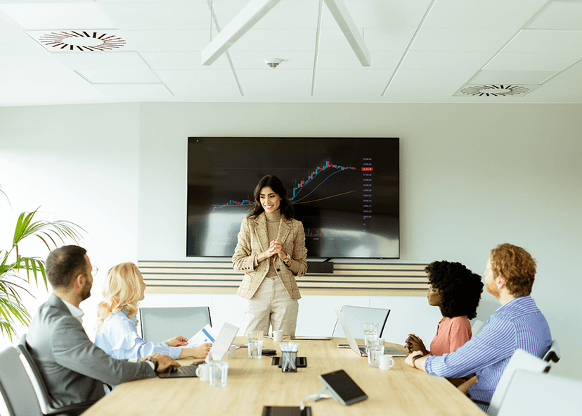 Woman giving presentation in conference room